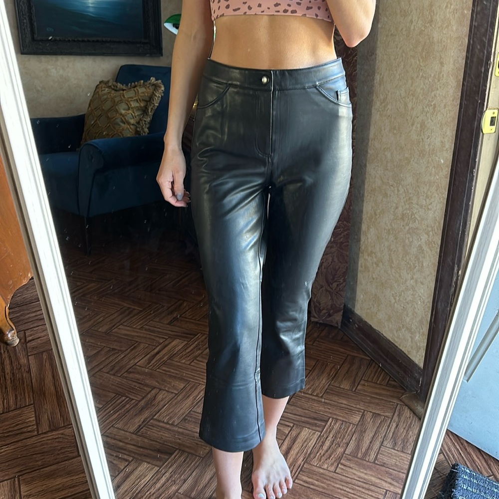 Black faux leather kick flare pants